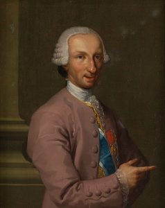 Carlos III con traje de corte rosa