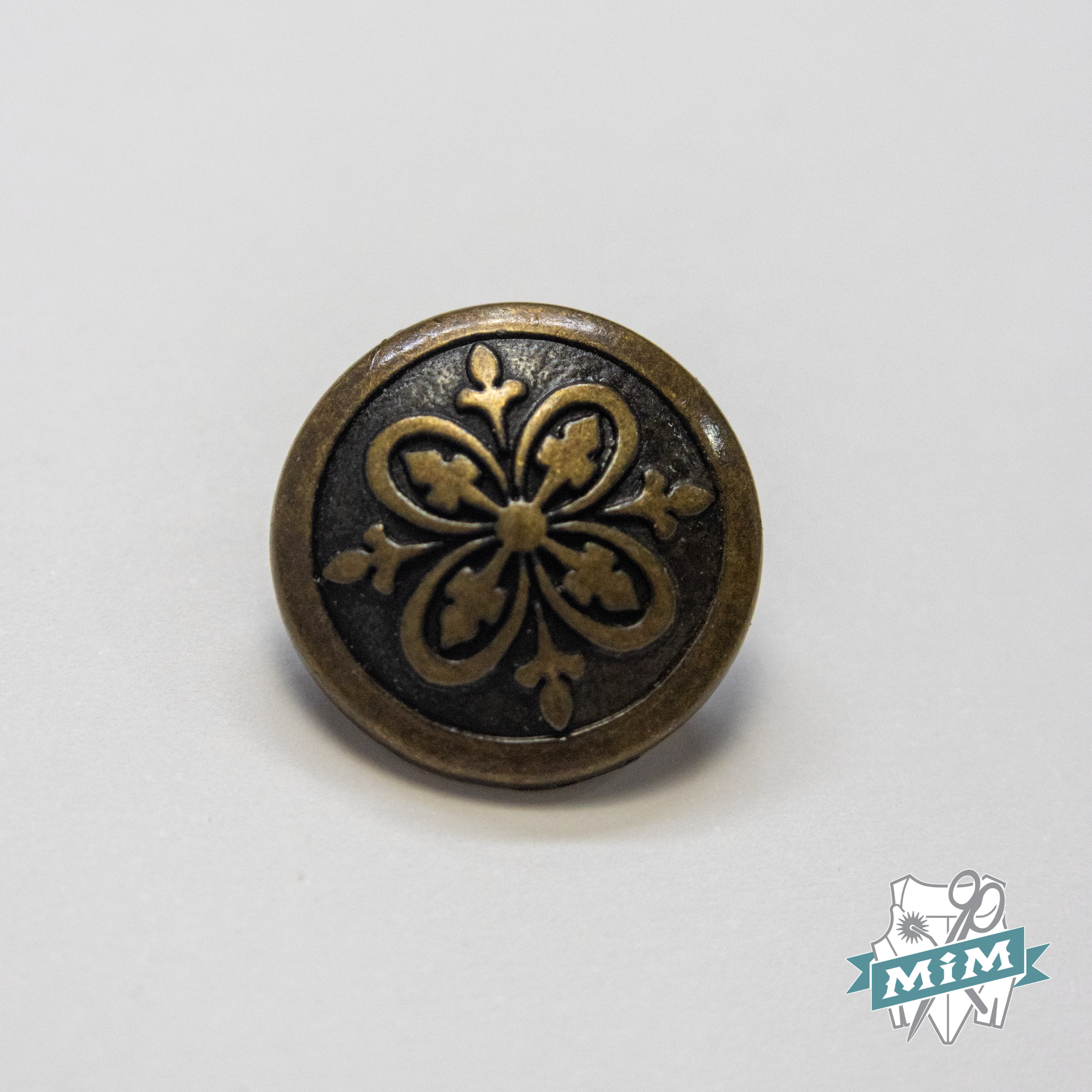 Botón  modelo «4 cruces» oro viejo – 2 cm